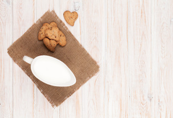 Jug of milk and heart shaped cookies