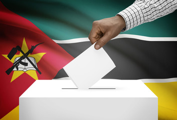 Ballot box with national flag on background - Mozambique