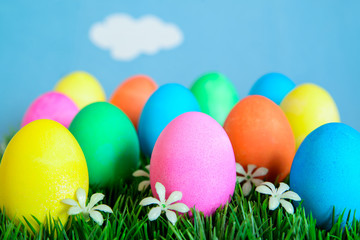 Fototapeta na wymiar Easter Eggs in Rows - Blue Sky