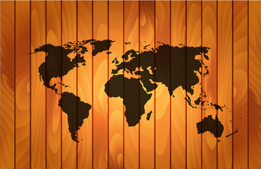 World map on wooden background
