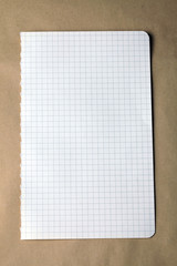 Fototapeta premium checked note on craft paper background