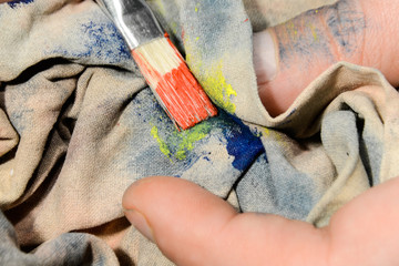 Painting a picture of saturated colors with acrylic paints