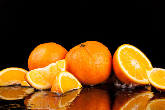 .Orange fruit isolated on a black background