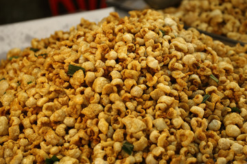 pork snack, pork rind, pork scratching or pork crackling (Thai s