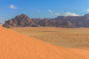Fototapeta na wymiar Spectacular Red Sand Dunes at Wadi Rum