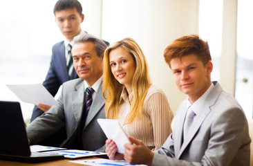 serious business team with tablet pc computers