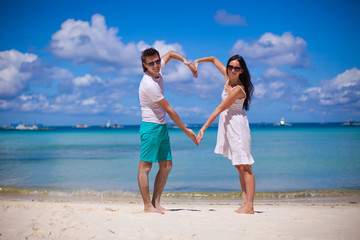 Romantic couple enjoy vacation on tropical white beach