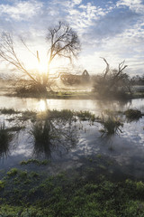 Beautiful sunrise landscape of Priory ruins in countryside locat