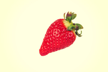 One separated fresh strawberry.