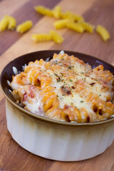rotini spiral pasta gratin on table