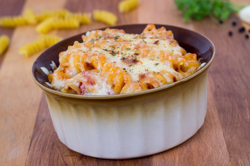 rotini spiral pasta gratin on table