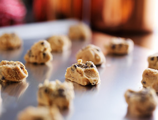 baking tray with uncooked chocolate cookie dough