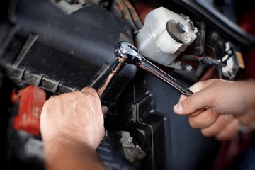 Mechanic working in auto repair garage