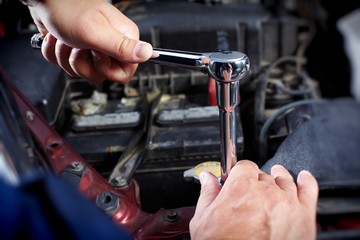Mechanic working in auto repair garage