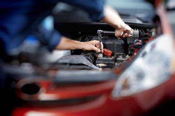 Mechanic working in auto repair garage