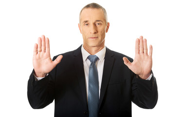 Businessman pressing an abstract touchscreen