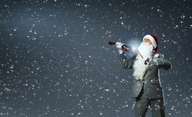 Fototapeta premium Santa play violin