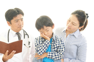 具合の悪い男の子