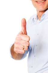 Mature man gesturing ok sign