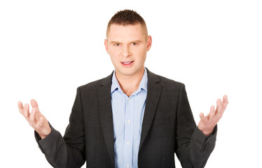 Angry businessman with open hands