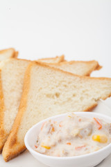 bread sandwich with tuna fish on white paper background