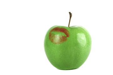 kiss red lipstick on green apple
