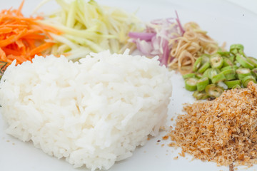 Nasi kerabu or kao yum, Southen Thai-Style rice with herbs and v