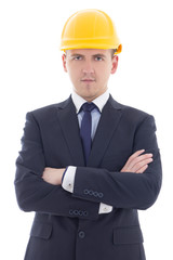 young handsome business man in yellow builder's helmet isolated