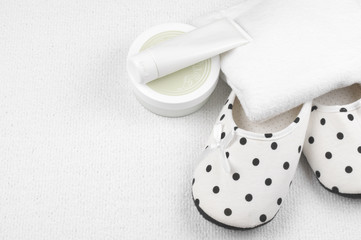 Feminine slippers and toiletry