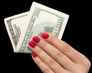 dollars in hand with red manicure