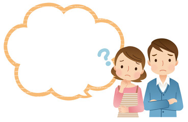 悩んでいる若い夫婦　コピースペース