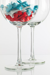 Two glasses of wine and golf equipments