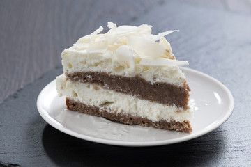 piece of chocolate cake with coconut cream