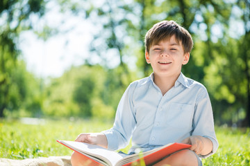 Boy in summer park