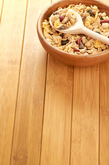 Delicious and healthy cereal in bowl with milk