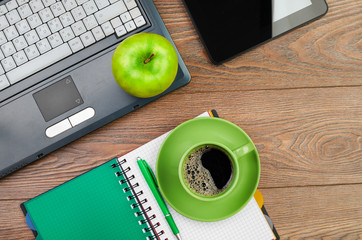 green apple on worplace