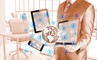 Business man using tablet PC and smartphone social connection