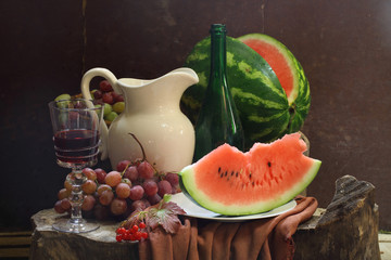 Wine, water-melon, grapes, guelder-rose and white jug
