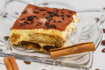 Tiramisu Cake with coffee beans and cinnamon
