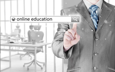 Online education written in search bar on virtual screen.