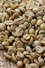 green coffee beans on sack