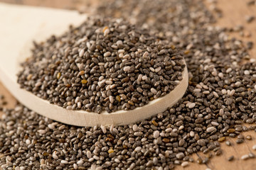 chia seeds on wooden surface