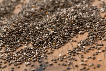chia seeds on wooden surface