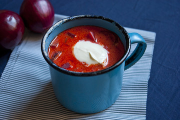Ukrainian and russian national red soup borsch closeup
