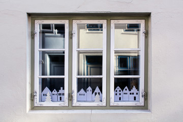 paper town in a window