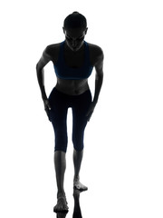 woman exercising yoga warrior position silhouette