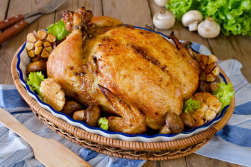 Whole roasted chicken stuffed with buckwheat and mushrooms