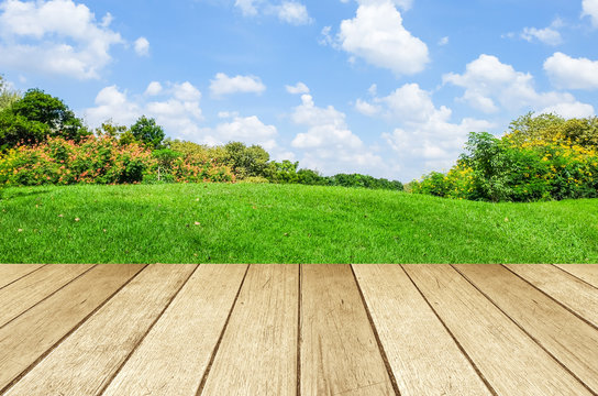 Perspective wood over blur landscape background