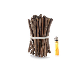 bundle of firewood with lighters on white