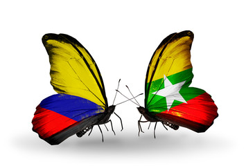 Two butterflies with flags Columbia and Myanmar